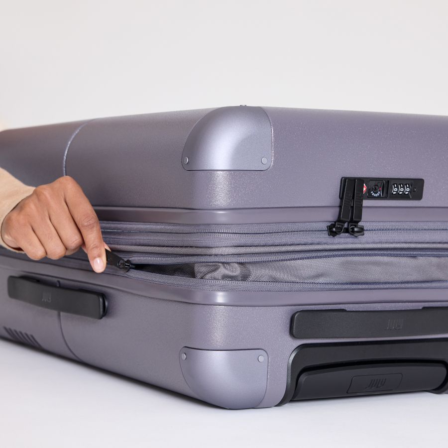 The expandable zip on the July Carry On Max