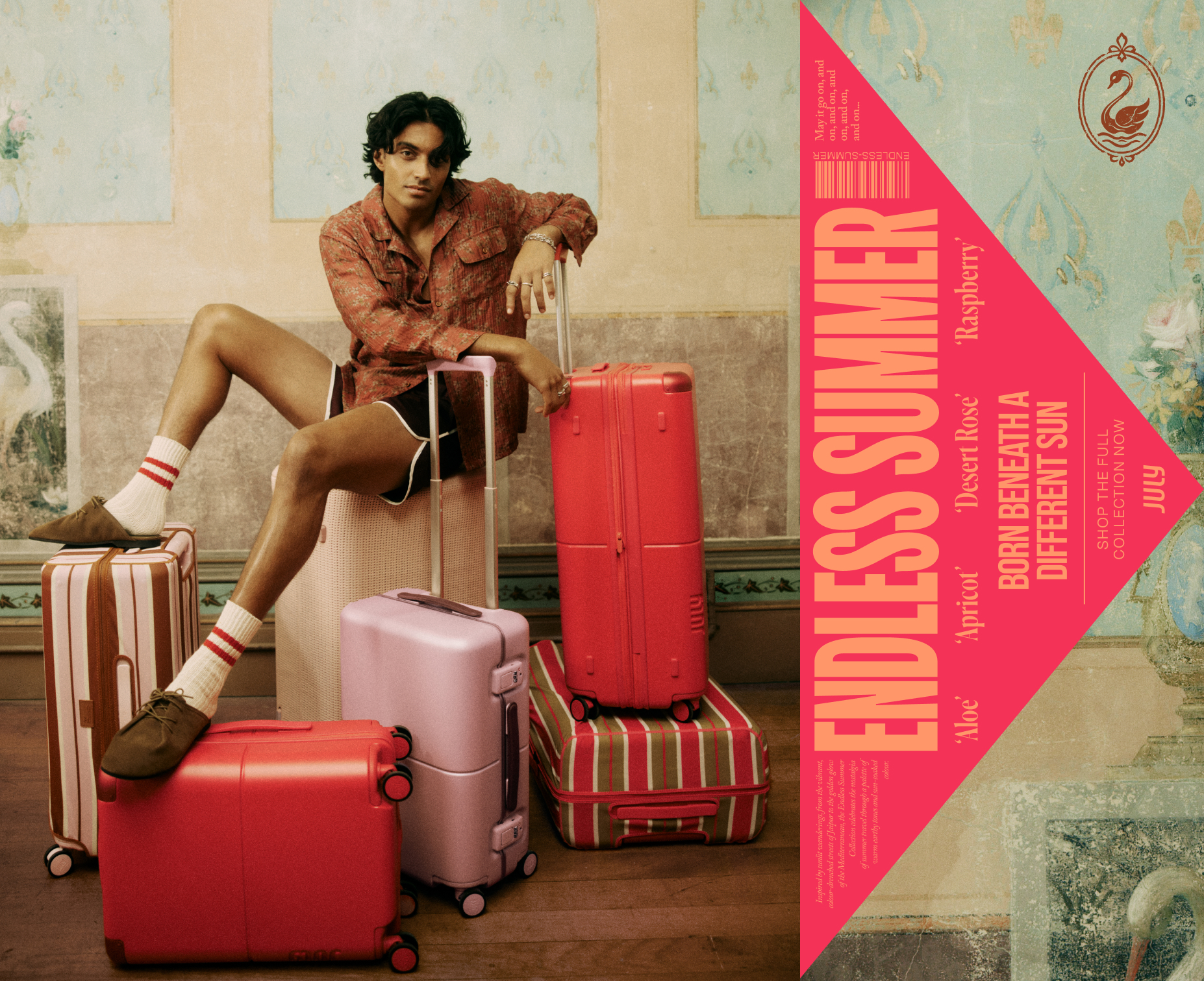 Model seated among July suitcases in Aloe, Apricot, Desert Rose and Raspberry. Born beneath a different sun - shop the full collection now.